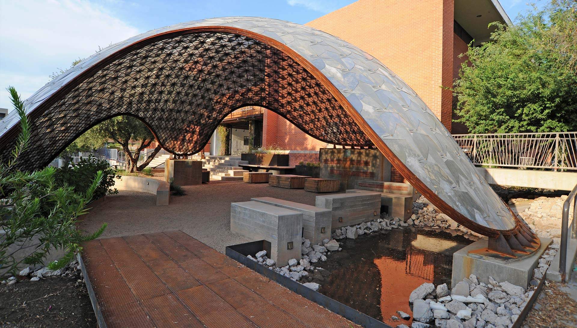 Site features on the gridshell: bridge, stairs, ramps, seats, and lighting.